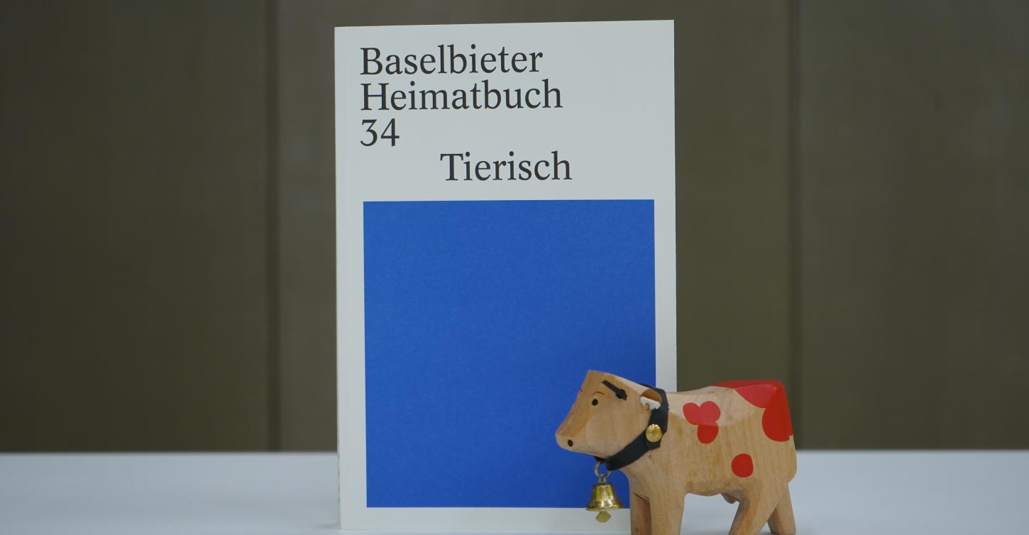 Cover Baselbieter Heimatbuch 34 "Tierisch" mit Kuhfigur